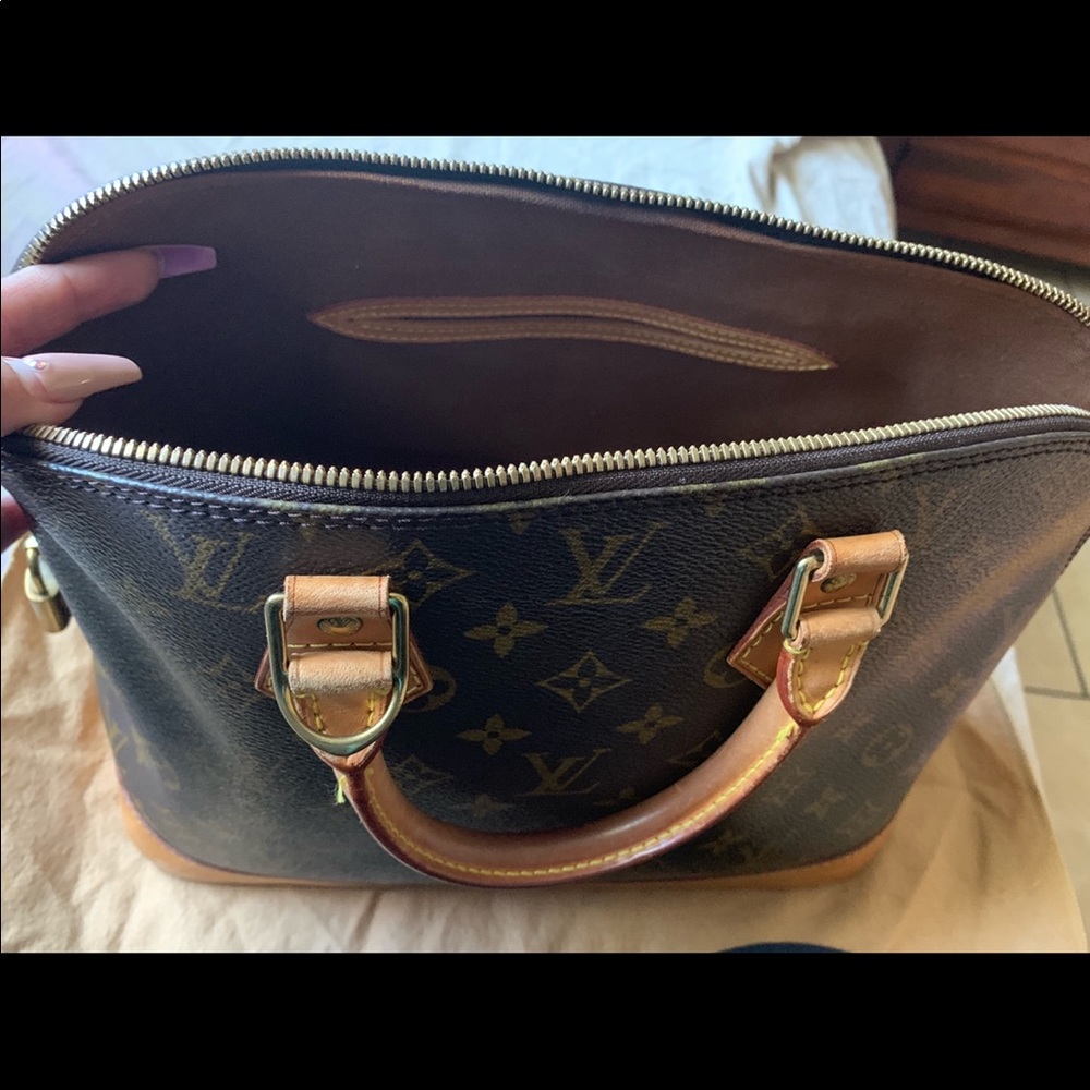 Authentic Louis Vuitton Alma Monogram Canvas